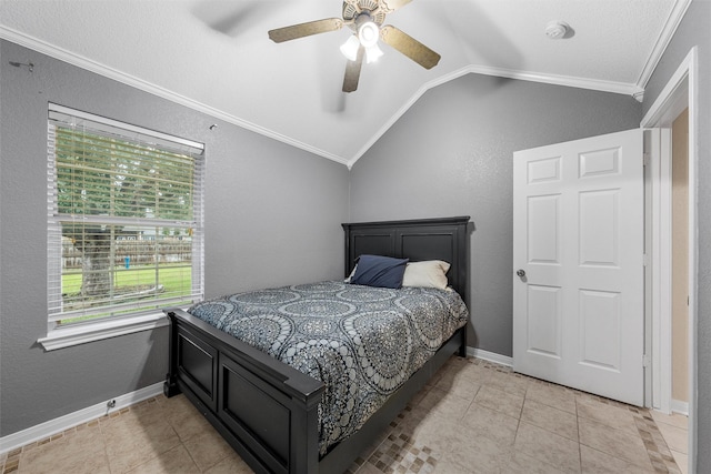 10612 Calaveras Dr, Waco, TX 76708 - bedroom with crown molding, vaulted ceiling, light tile patterned floors, a ceiling fan, and a textured wall