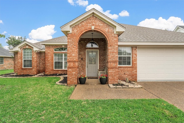 10612 Calaveras Dr, Waco, TX 76708 - view of front facade with brick siding, roof with shingles, a front lawn, driveway, and a garage