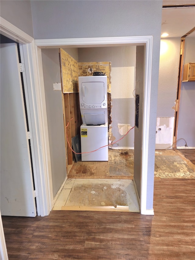 2164 Tanglewood Blvd Unit B202, Pottsboro, TX 75076 - laundry area with stacked washer / drying machine and wood finished floors