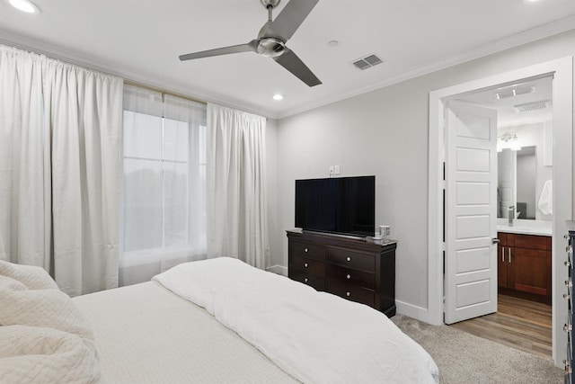 461 Rayner Ave, Fort Worth, TX 76111 - bedroom featuring baseboards, crown molding, recessed lighting, ensuite bathroom, and carpet