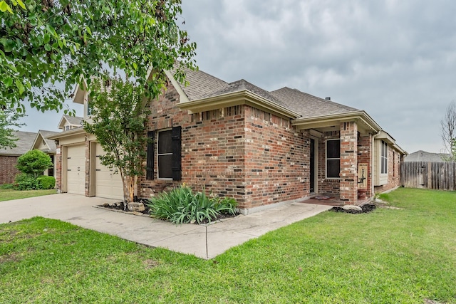 1260 Mountain Peak Dr, Fort Worth, TX 76052 - view of front of home featuring brick siding, driveway, and a garage