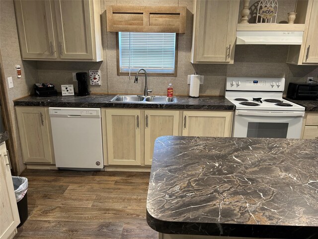 204 N Marion St, Richland Springs, TX 76871 - kitchen with white appliances, a sink, under cabinet range hood, and dark countertops