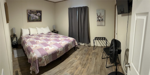 204 N Marion St, Richland Springs, TX 76871 - bedroom with wood finished floors