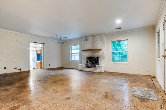 1455 N Joe Wilson Rd, Cedar Hill, TX 75104 - unfurnished living room with crown molding, a fireplace, and concrete flooring