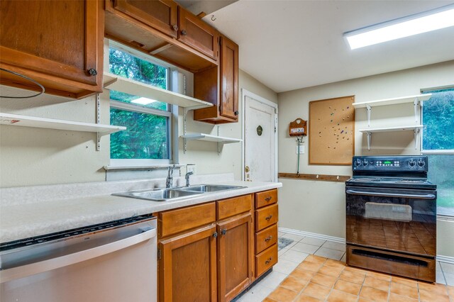 1455 N Joe Wilson Rd, Cedar Hill, TX 75104 - kitchen featuring black electric range, stainless steel dishwasher, open shelves, and a sink