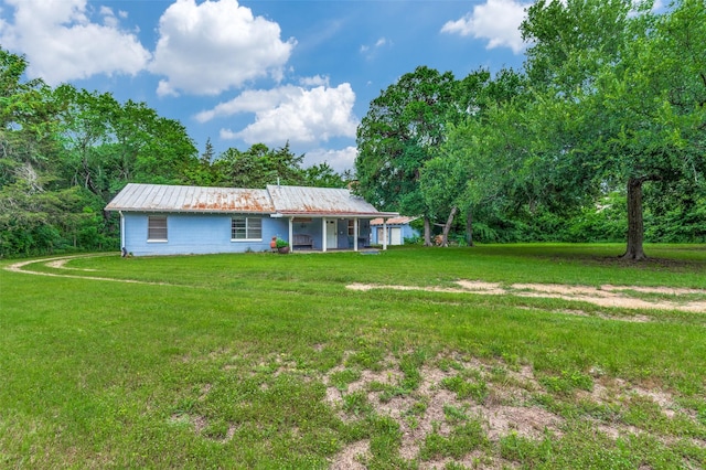 1455 N Joe Wilson Rd, Cedar Hill, TX 75104 - view of front of home featuring a front lawn and metal roof