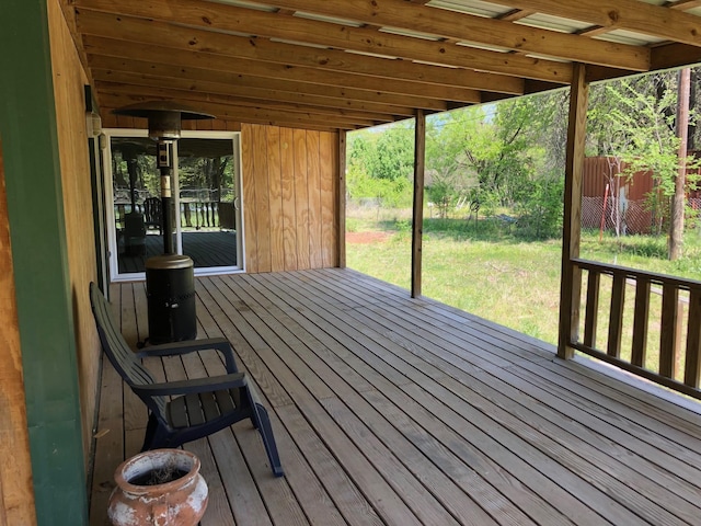 132 Keck St, Nocona, TX 76255 - deck featuring a lawn