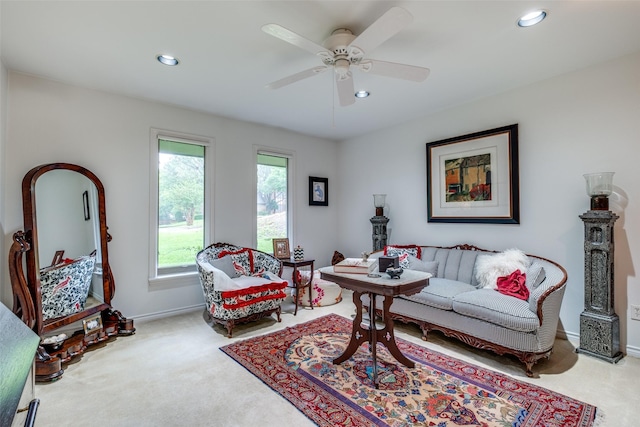 carpeted living room with recessed lighting, ceiling fan, and baseboards