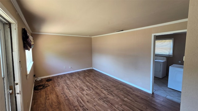 897 Sunset Dr, Abilene, TX 79605 - empty room with washer / clothes dryer, wood finished floors, crown molding, and baseboards