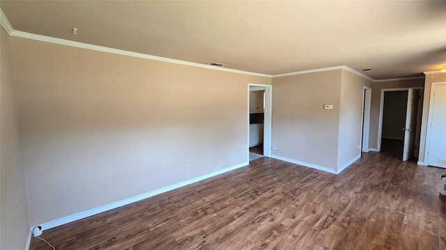 897 Sunset Dr, Abilene, TX 79605 - unfurnished room featuring dark wood-style flooring, baseboards, and crown molding