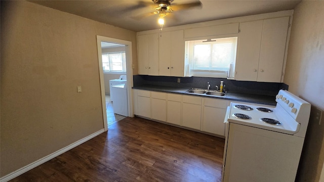 897 Sunset Dr, Abilene, TX 79605 - kitchen featuring white electric range oven, a sink, dark countertops, dark wood-style floors, and a ceiling fan