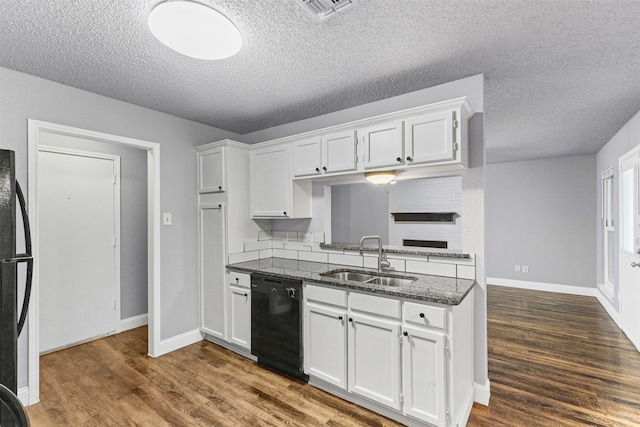 kitchen with black appliances, a sink, white cabinetry, dark wood finished floors, and baseboards