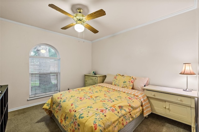 bedroom featuring dark carpet, ornamental molding, a ceiling fan, and baseboards