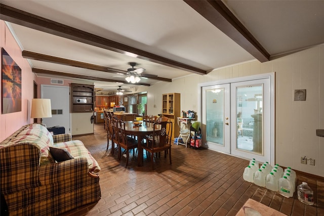 201 Sunset Dr, Fairfield, TX 75840 - dining space with beamed ceiling, ceiling fan, and french doors