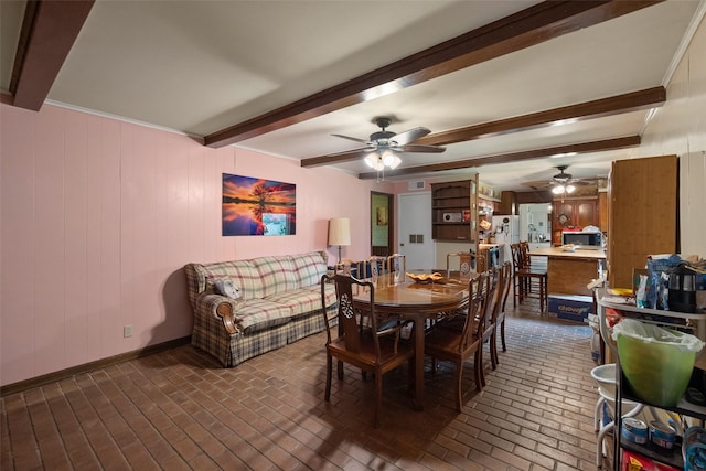 201 Sunset Dr, Fairfield, TX 75840 - dining space with a ceiling fan, beam ceiling, and brick patterned flooring