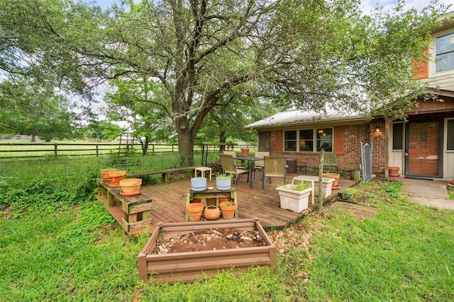 201 Sunset Dr, Fairfield, TX 75840 - view of yard with outdoor dining space, fence, and a wooden deck