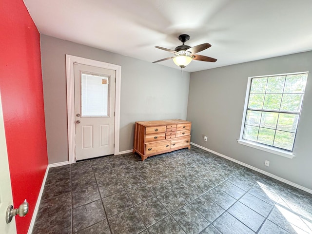 3836 Farm Road 196 N, Paris, TX 75462 - empty room featuring ceiling fan and baseboards