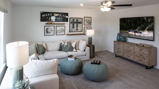 living room featuring carpet, ceiling fan, recessed lighting, and baseboards