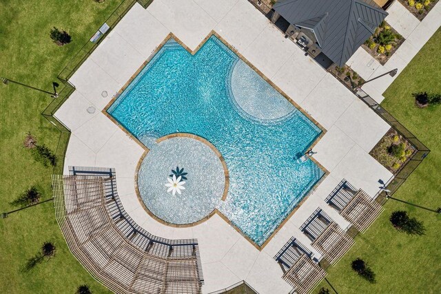 community pool with a lawn