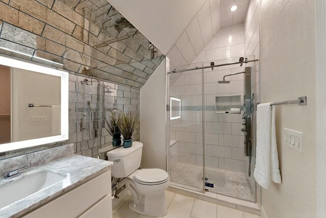 3001 Pecan Grove Ln, Celina, TX 75078 - full bath with toilet, a shower stall, vanity, tile patterned flooring, and tile walls