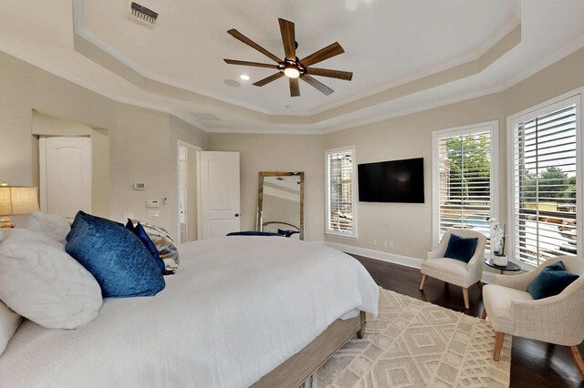 3001 Pecan Grove Ln, Celina, TX 75078 - bedroom featuring a tray ceiling, wood finished floors, crown molding, baseboards, and recessed lighting
