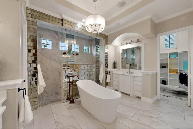 3001 Pecan Grove Ln, Celina, TX 75078 - bathroom featuring ornamental molding, walk in shower, a chandelier, a soaking tub, and vanity