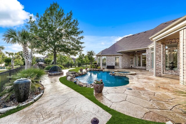 3001 Pecan Grove Ln, Celina, TX 75078 - view of pool featuring a patio, a fire pit, a fenced backyard, and a pool with connected hot tub