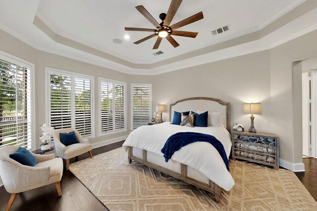 3001 Pecan Grove Ln, Celina, TX 75078 - bedroom featuring a tray ceiling, wood finished floors, crown molding, baseboards, and recessed lighting