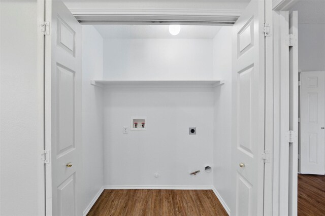 2763 Beverly Dr, Rockwall, TX 75032 - washroom with washer hookup, hookup for a gas dryer, hookup for an electric dryer, dark wood-style floors, and baseboards