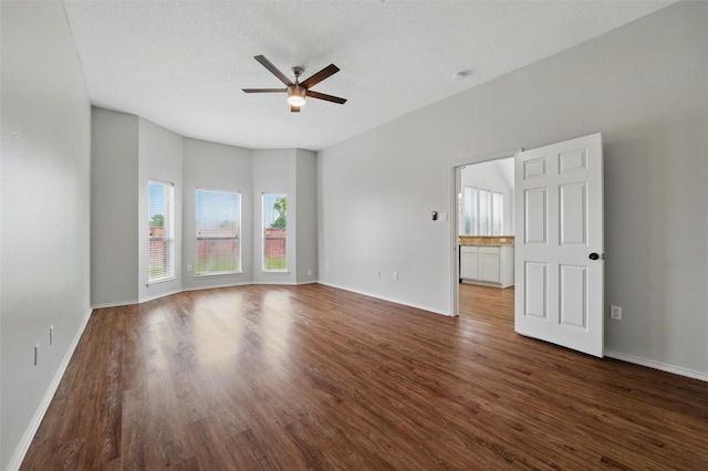 2763 Beverly Dr, Rockwall, TX 75032 - unfurnished room featuring a ceiling fan, wood finished floors, and baseboards