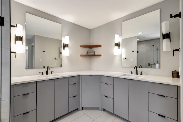 6522 Willow Ln, Dallas, TX 75230 - full bath with a shower stall, double vanity, and tile patterned floors