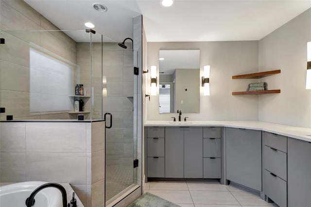 6522 Willow Ln, Dallas, TX 75230 - bathroom with vanity, a stall shower, tile patterned floors, a tub to relax in, and recessed lighting