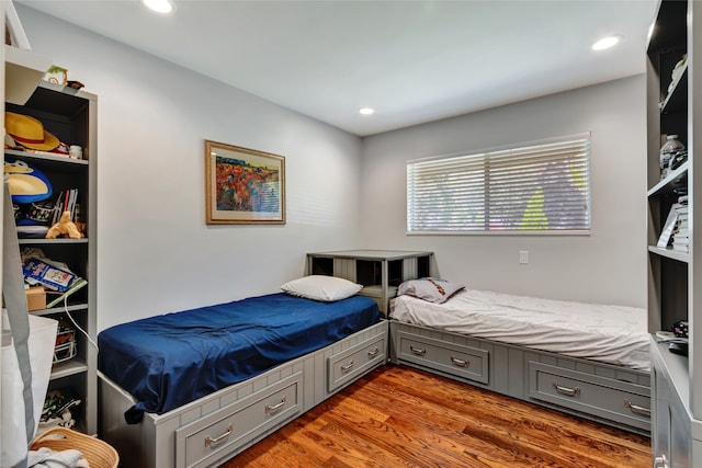 6522 Willow Ln, Dallas, TX 75230 - bedroom featuring wood finished floors and recessed lighting