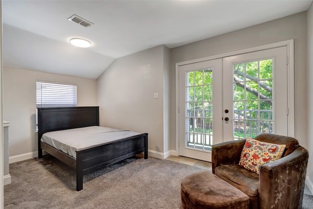 6522 Willow Ln, Dallas, TX 75230 - carpeted bedroom with access to outside, baseboards, vaulted ceiling, and french doors