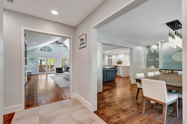 6522 Willow Ln, Dallas, TX 75230 - dining space with vaulted ceiling, a ceiling fan, baseboards, recessed lighting, and wood finished floors