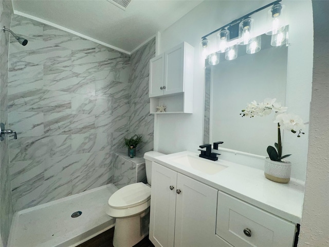 2719 S 27th, Waco, TX 76706 - bathroom with a stall shower, vanity, and toilet