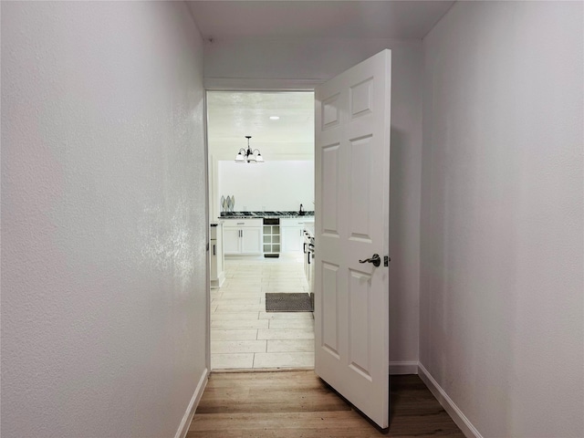 2719 S 27th, Waco, TX 76706 - corridor featuring light wood-style floors and baseboards