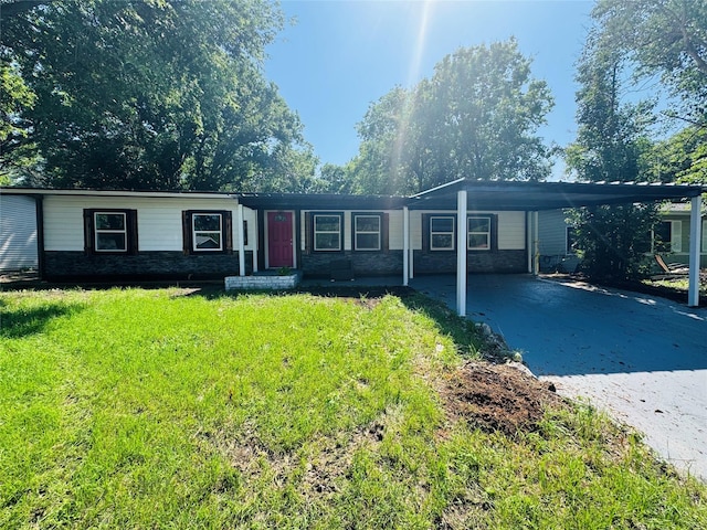 2719 S 27th, Waco, TX 76706 - single story home featuring driveway, a front yard, and an attached carport
