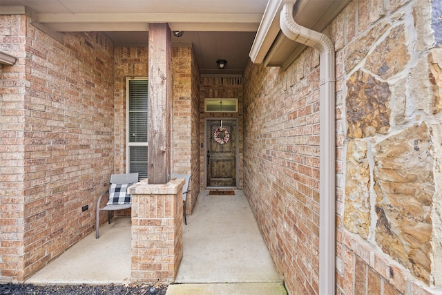 2725 Buffalo Run, Burleson, TX 76028 - doorway to property with covered porch and brick siding
