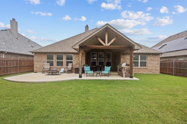 2725 Buffalo Run, Burleson, TX 76028 - back of property with a patio, brick siding, a chimney, and roof with shingles