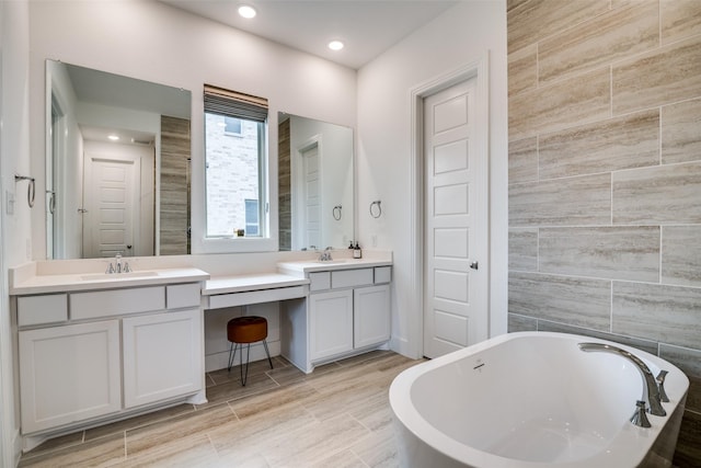 2309 Albion Way, Forney, TX 75126 - full bathroom with a freestanding tub, vanity, and recessed lighting
