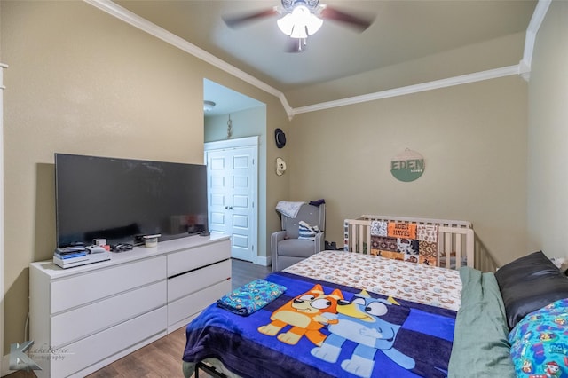 1001 Cabernet Dr, Abilene, TX 79601 - bedroom featuring wood finished floors, crown molding, and a ceiling fan