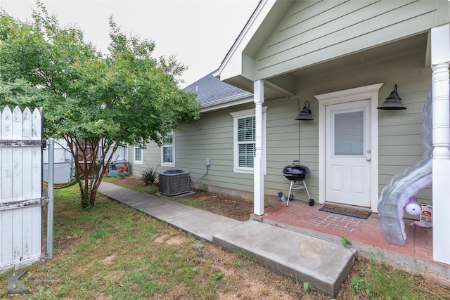 1001 Cabernet Dr, Abilene, TX 79601 - property entrance with central AC unit and a shingled roof