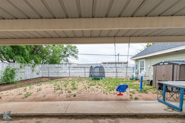 1001 Cabernet Dr, Abilene, TX 79601 - view of yard with an outdoor structure and fence