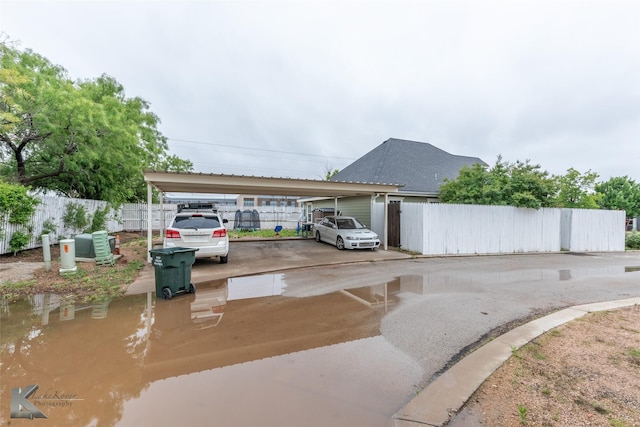1001 Cabernet Dr, Abilene, TX 79601 - ranch-style house featuring fence and a carport