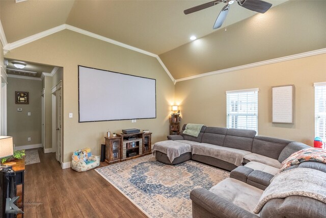 1001 Cabernet Dr, Abilene, TX 79601 - home theater room with lofted ceiling, dark wood finished floors, crown molding, a ceiling fan, and baseboards