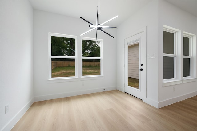 3900 De Maggio Ave, Dallas, TX 75210 - unfurnished room featuring light wood-style floors