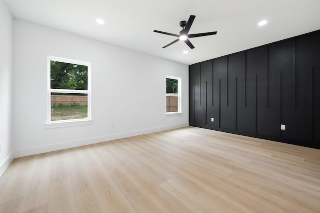 3900 De Maggio Ave, Dallas, TX 75210 - unfurnished bedroom featuring light wood-style flooring, recessed lighting, and a ceiling fan