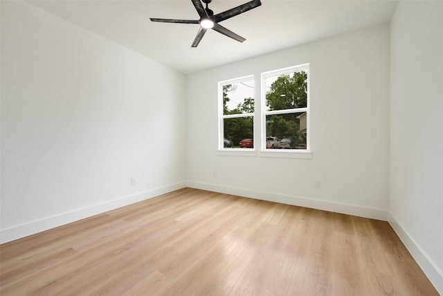 3900 De Maggio Ave, Dallas, TX 75210 - spare room featuring a ceiling fan and light wood-style floors
