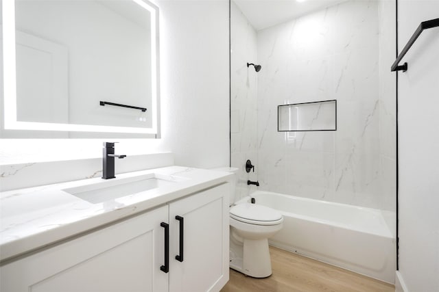 3900 De Maggio Ave, Dallas, TX 75210 - bathroom featuring vanity, wood finished floors, and shower / tub combination